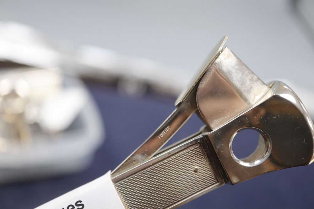 A modern silver mounted cigar cutter, 15.2cm.